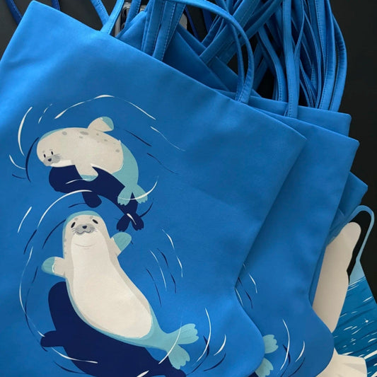 Dual-Sided Orca vs Seal Shoulder Bag