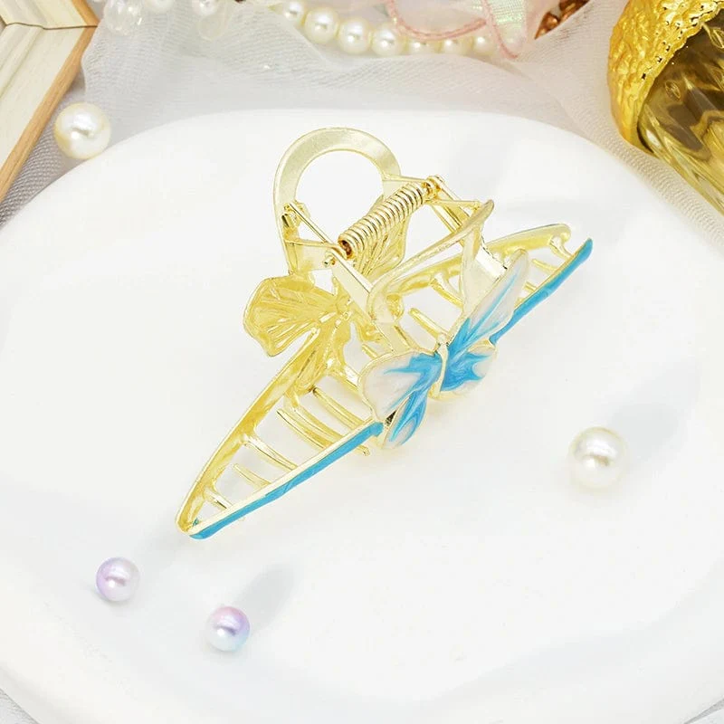 Magnifique griffe papillon bleu en mode X | NueShiny