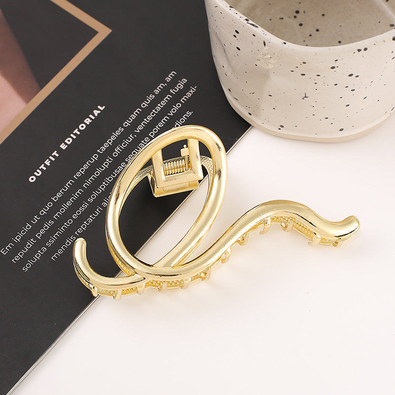 Large Snakelike Golden Hair Claw