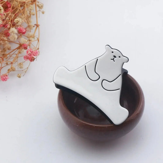 Adorable griffe en poils d'ours polaire blanc