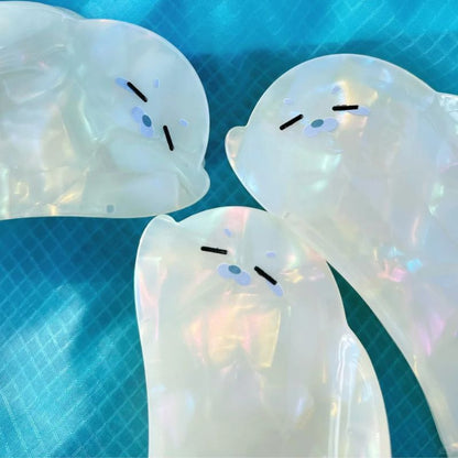 Squinting Transparent Iridescent White Seal Hair Claw