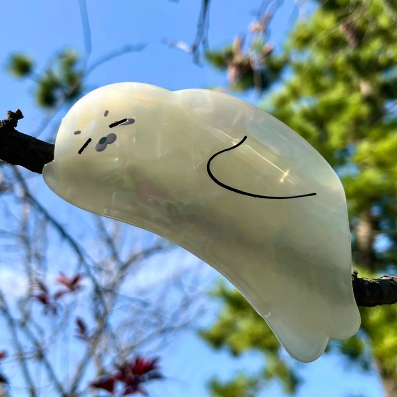 Squinting Transparent Iridescent White Seal Hair Claw