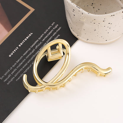 Large Snakelike Golden Hair Claw