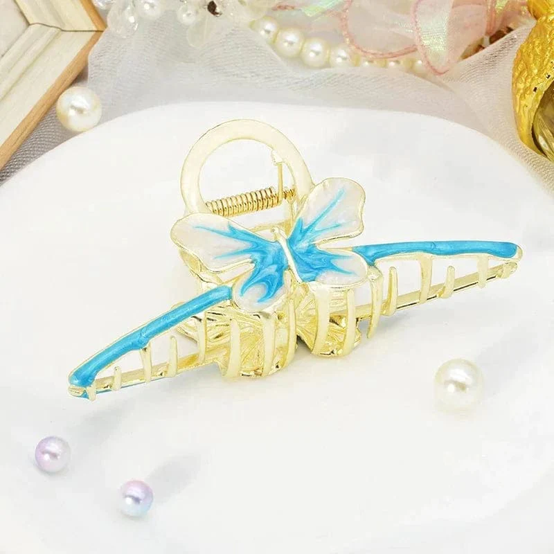 Magnifique griffe papillon bleu en mode X | NueShiny