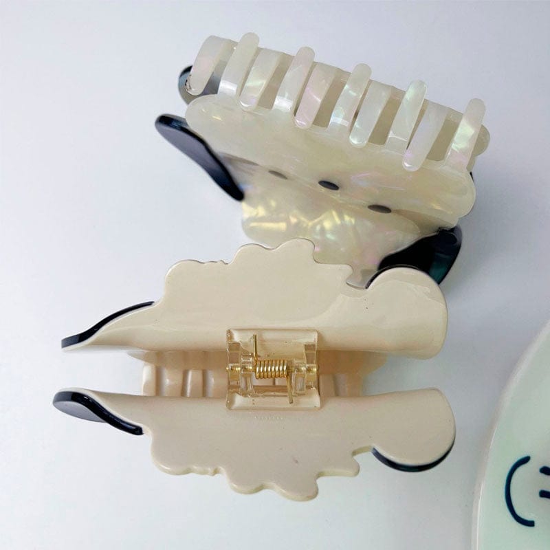 Adorable Cream Dog Hair Claw