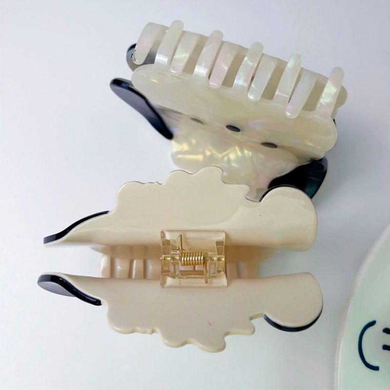 Adorable White Dog Hair Claw