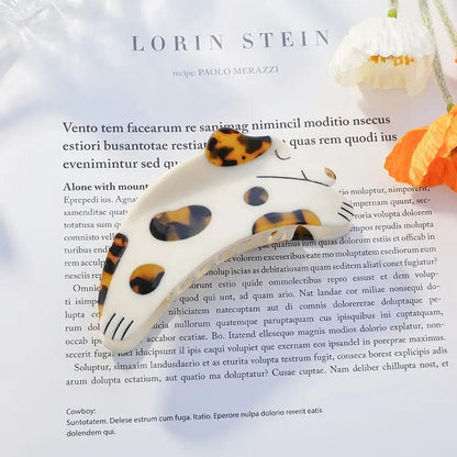 Brown Curious Dalmatian Dog Hair Claw