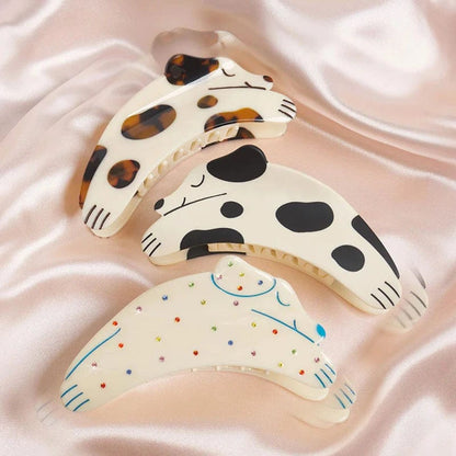 Brown Curious Dalmatian Dog Hair Claw