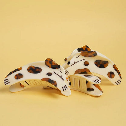 Brown Curious Dalmatian Dog Hair Claw