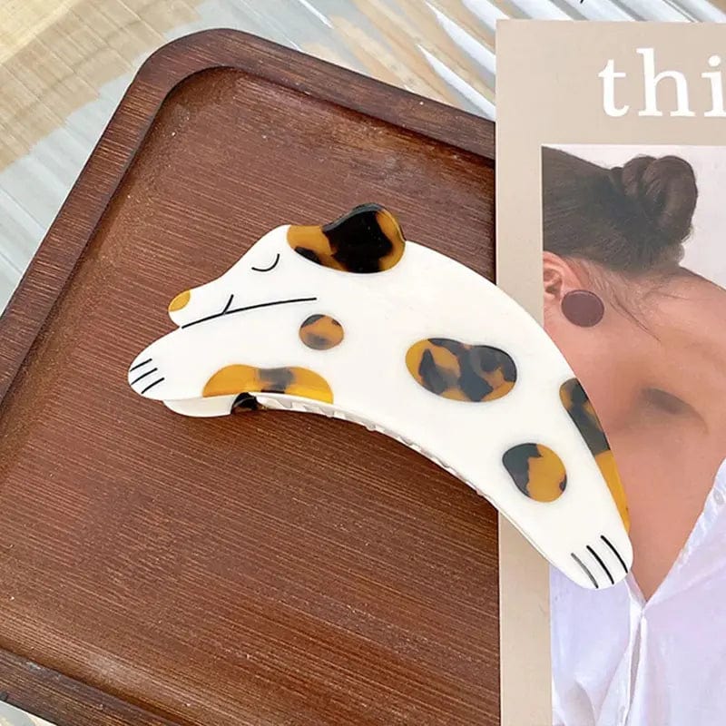 Brown Curious Dalmatian Dog Hair Claw