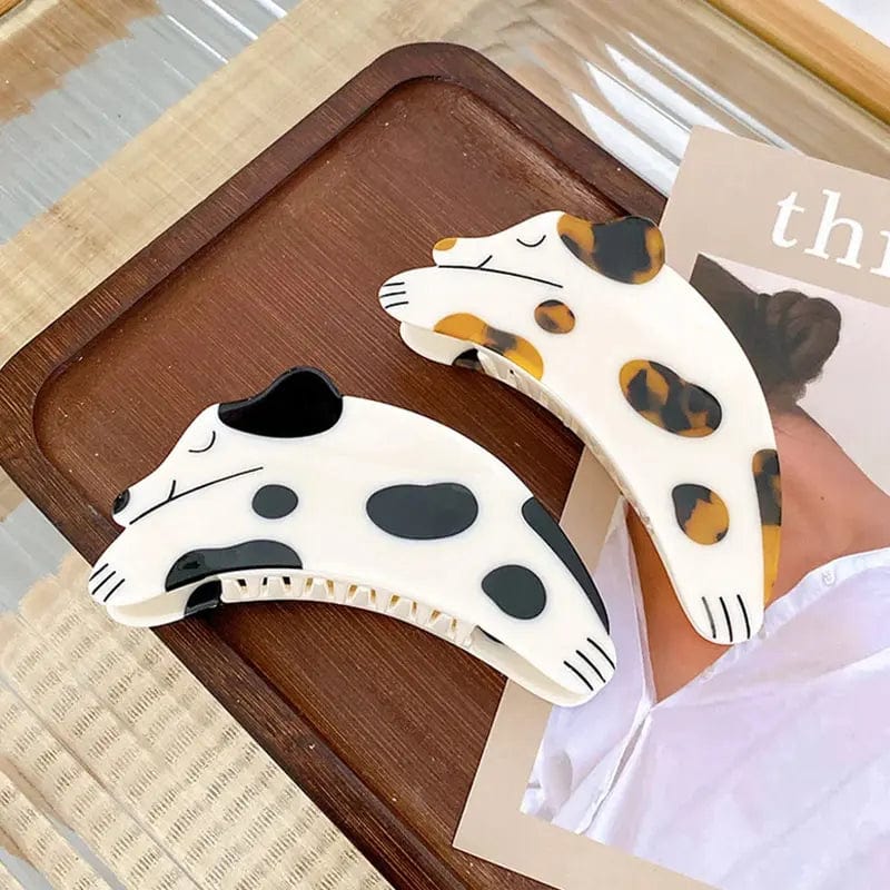 Brown Curious Dalmatian Dog Hair Claw