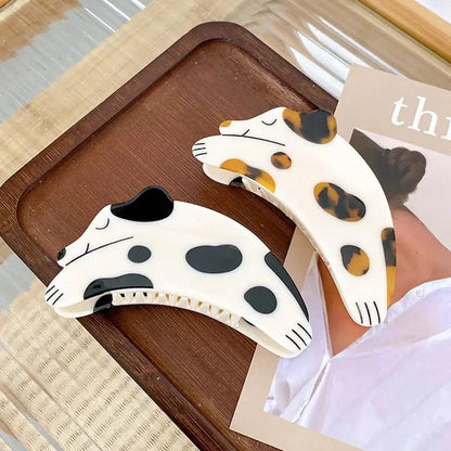 Brown Curious Dalmatian Dog Hair Claw