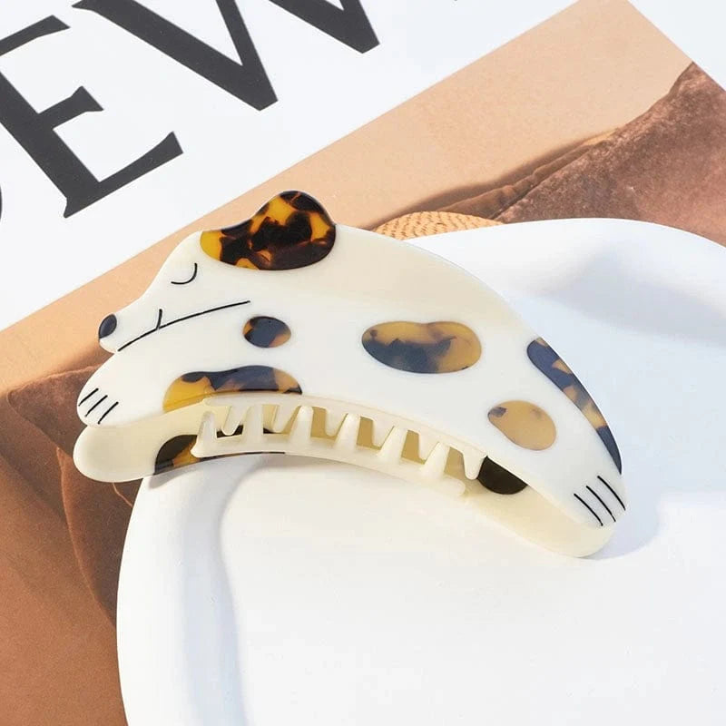Brown Curious Dalmatian Dog Hair Claw